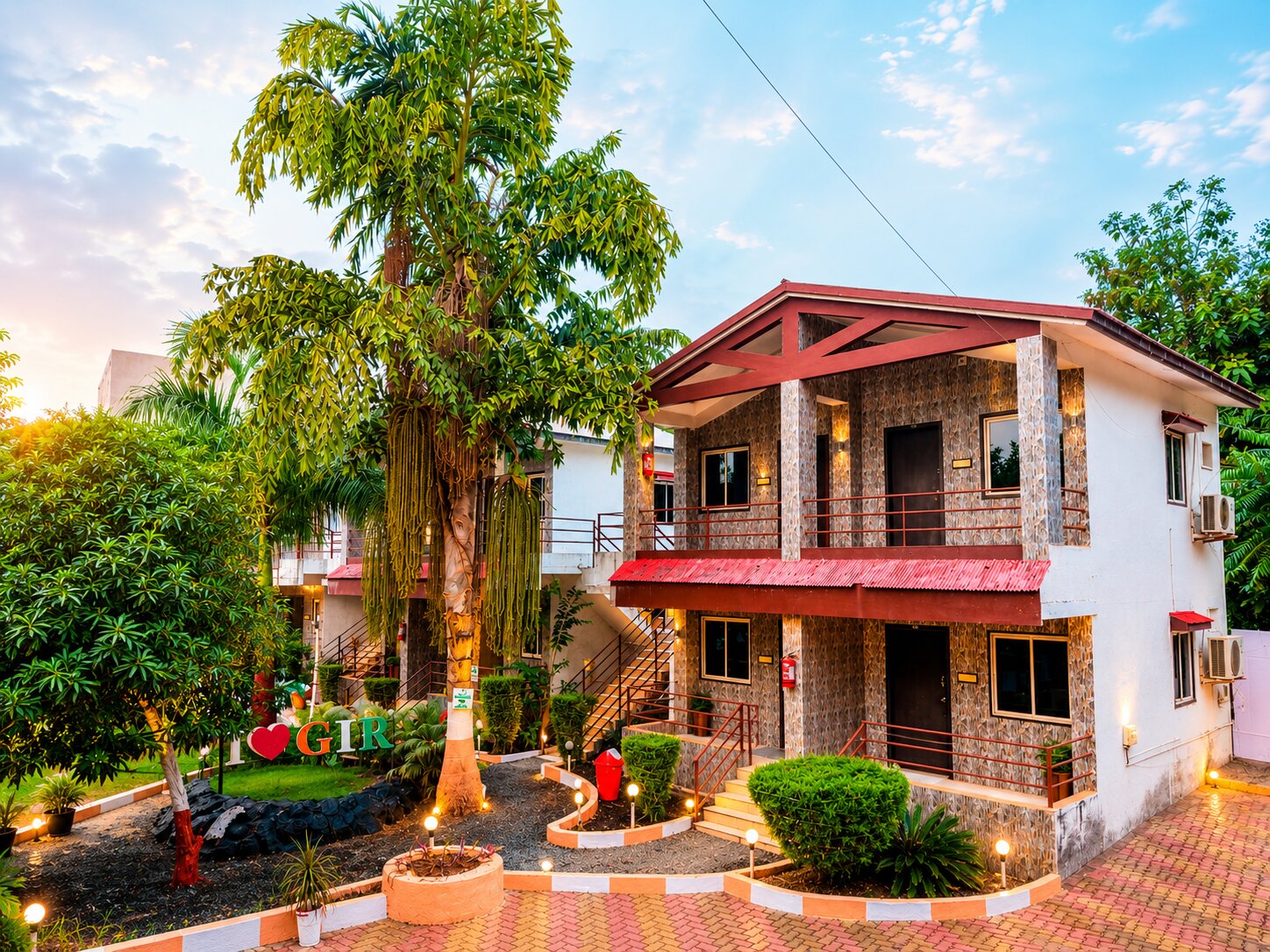 Deluxe cottage room interior at Wildlife Gir Resort